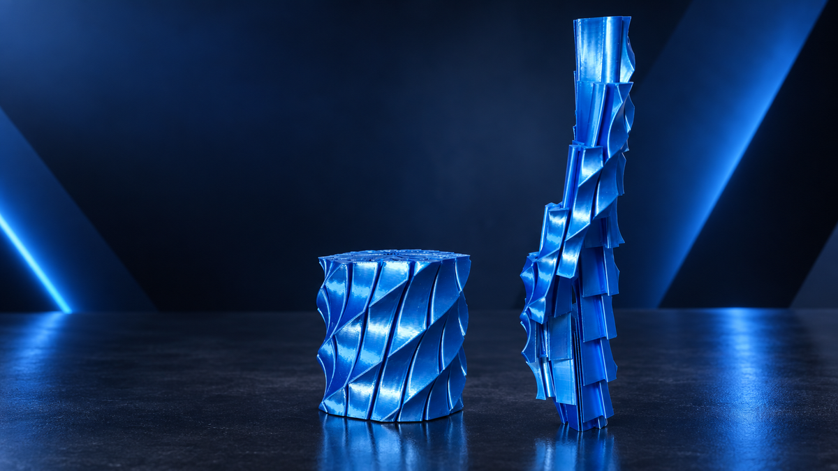 Blue Fidget Pull toy with a layered spiral design displayed on a dark surface